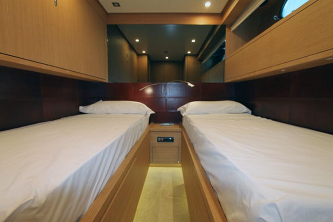 a room with bunk beds aboard JAD Yacht for Sale
