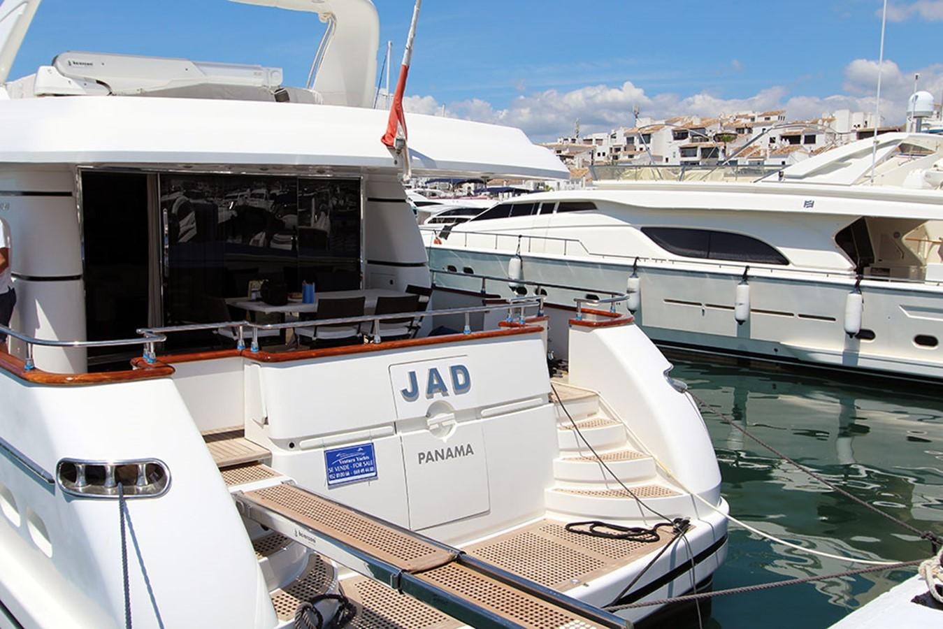 a group of boats are parked in a harbor aboard JAD Yacht for Sale