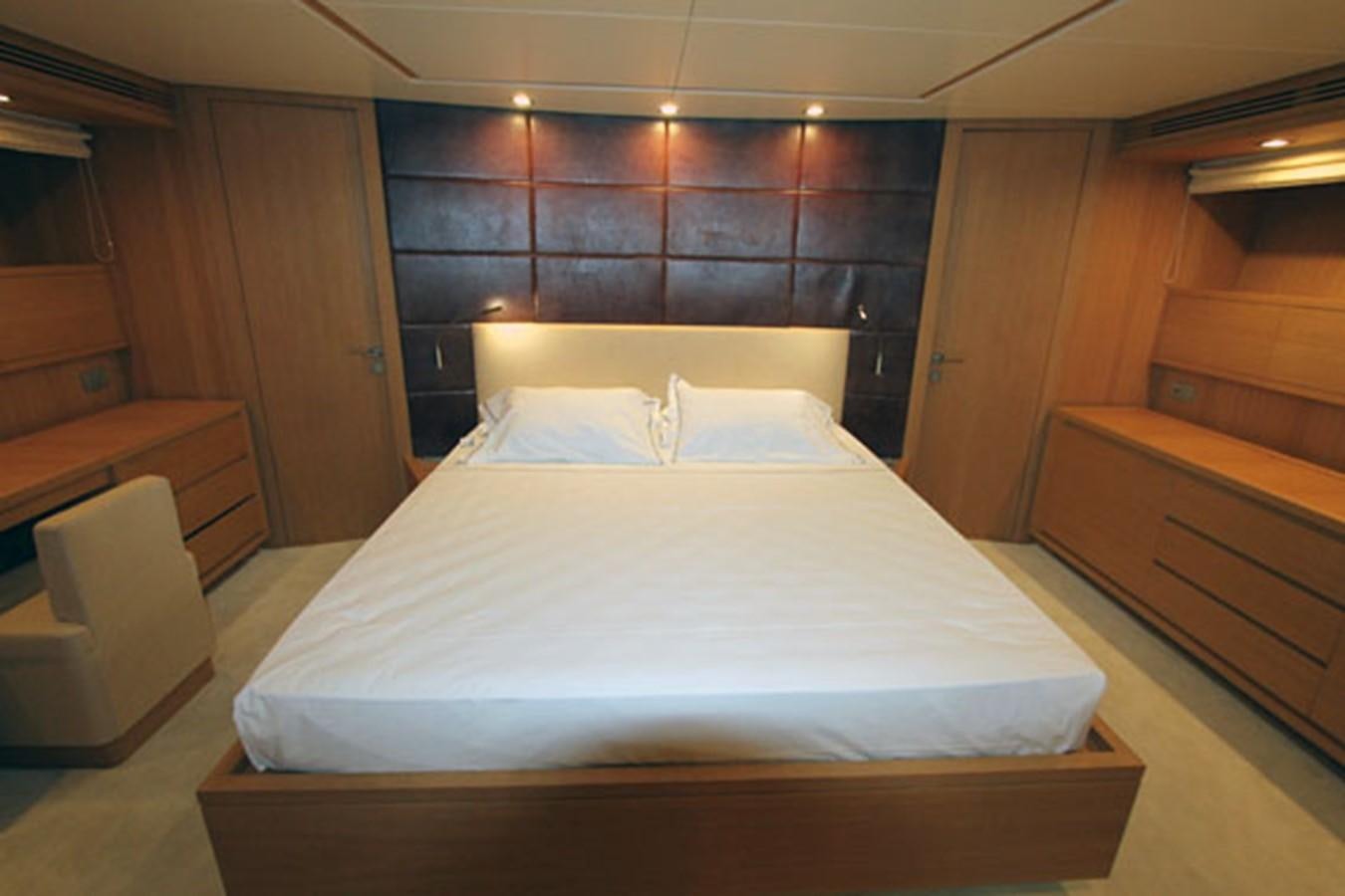 a bed in a room aboard JAD Yacht for Sale