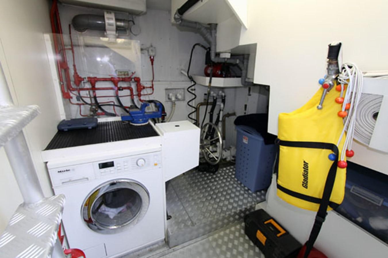 a yellow and white machine aboard JAD Yacht for Sale