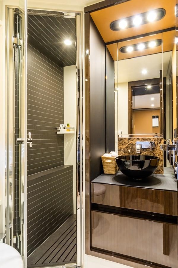 a bathroom with a sink and a mirror aboard YACHTI ANA Yacht for Sale