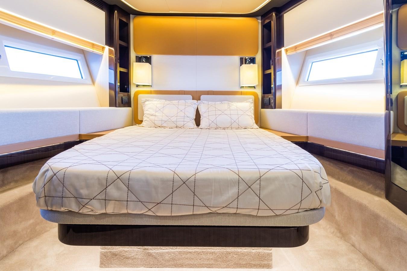 a bed in a room aboard YACHTI ANA Yacht for Sale