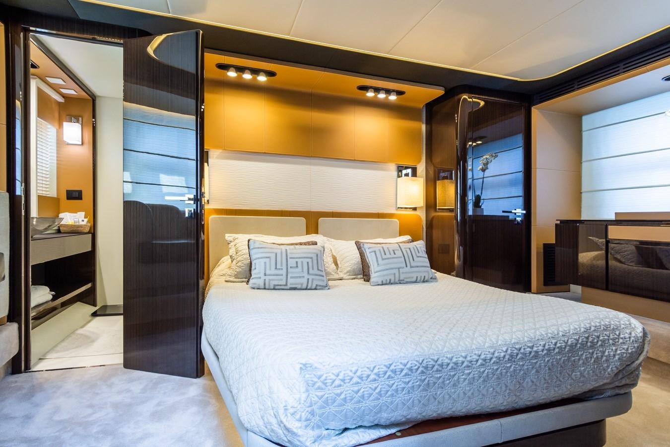 a bed in a room aboard YACHTI ANA Yacht for Sale