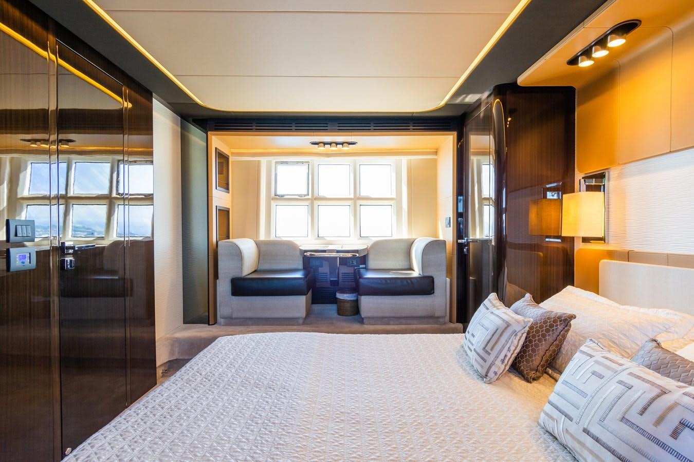a large bedroom with a large bed aboard YACHTI ANA Yacht for Sale