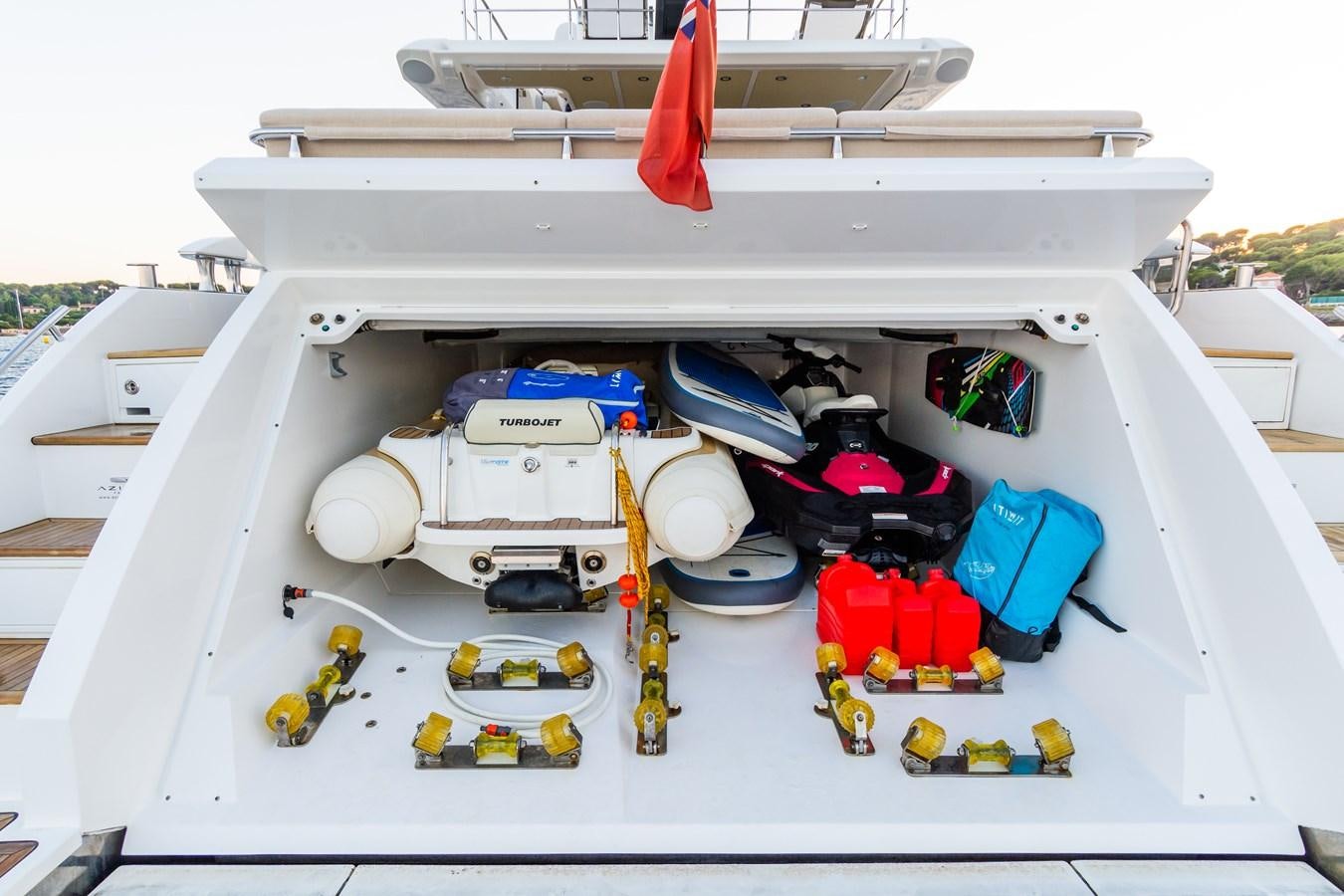a white rectangular object with a red ribbon on it aboard YACHTI ANA Yacht for Sale