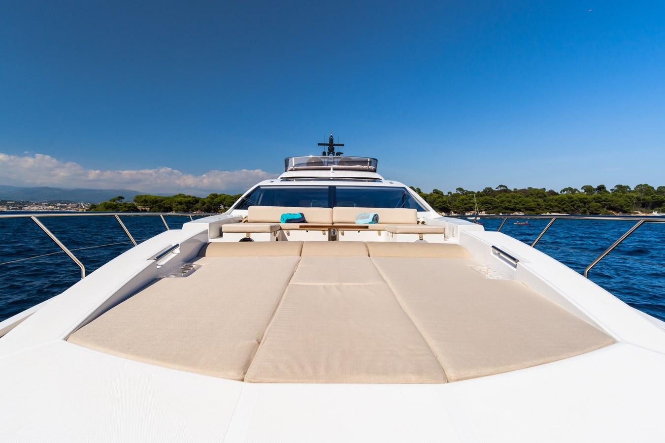 a white boat on a dock aboard YACHTI ANA Yacht for Sale