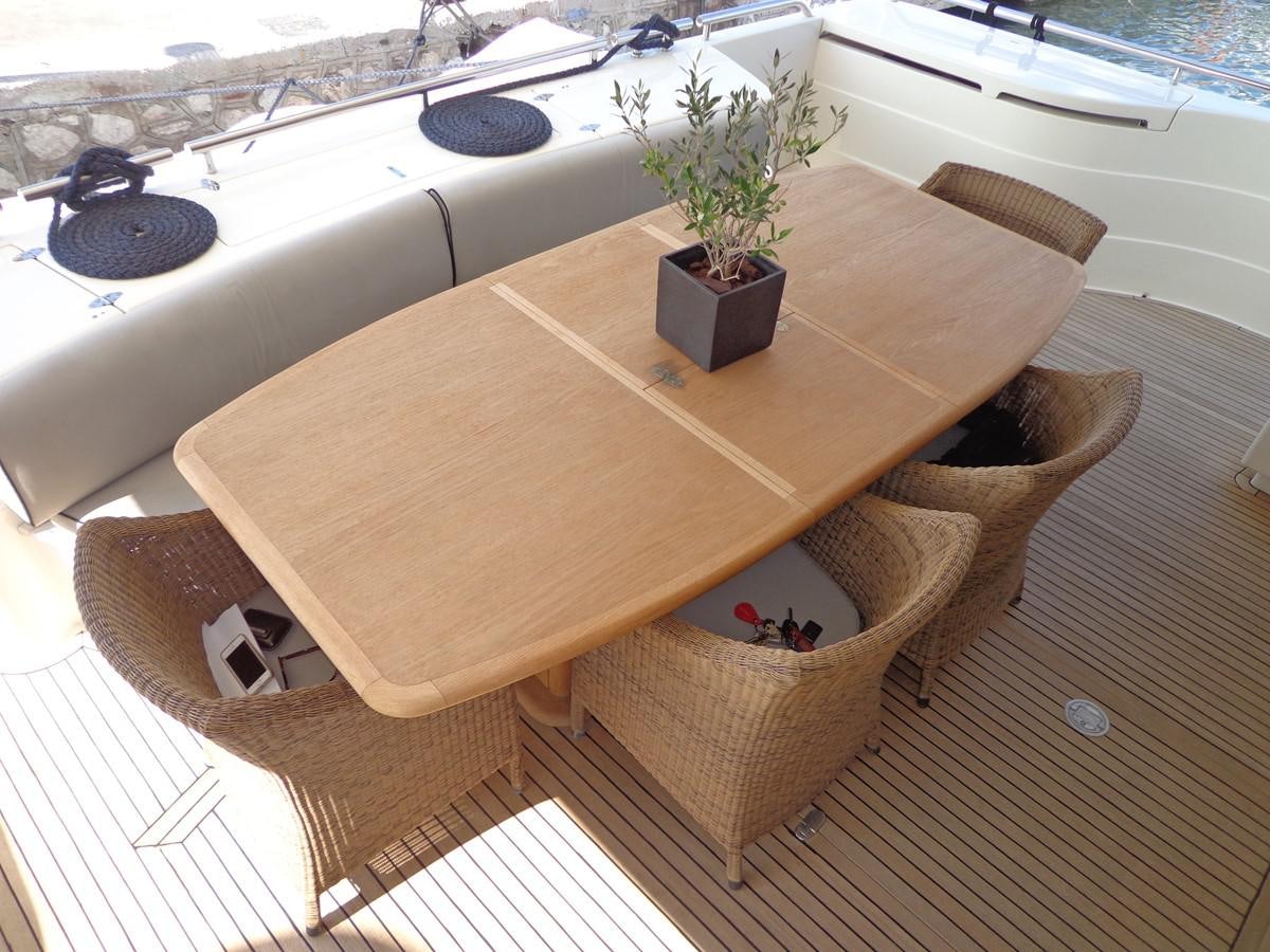 a wooden bench on a deck aboard FERRETTI 760 Yacht for Sale