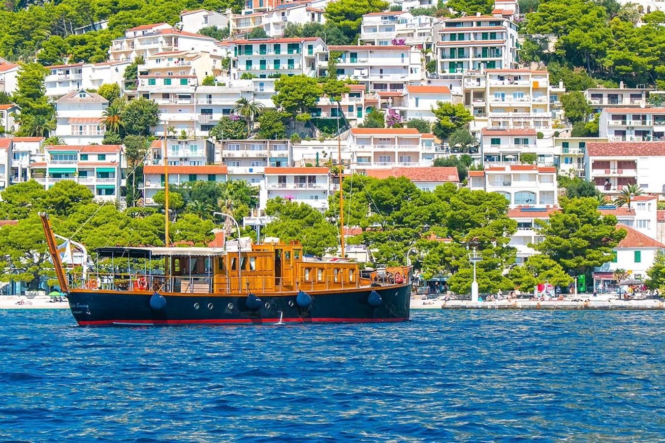 a boat on the water aboard LADY EMMA Yacht for Sale