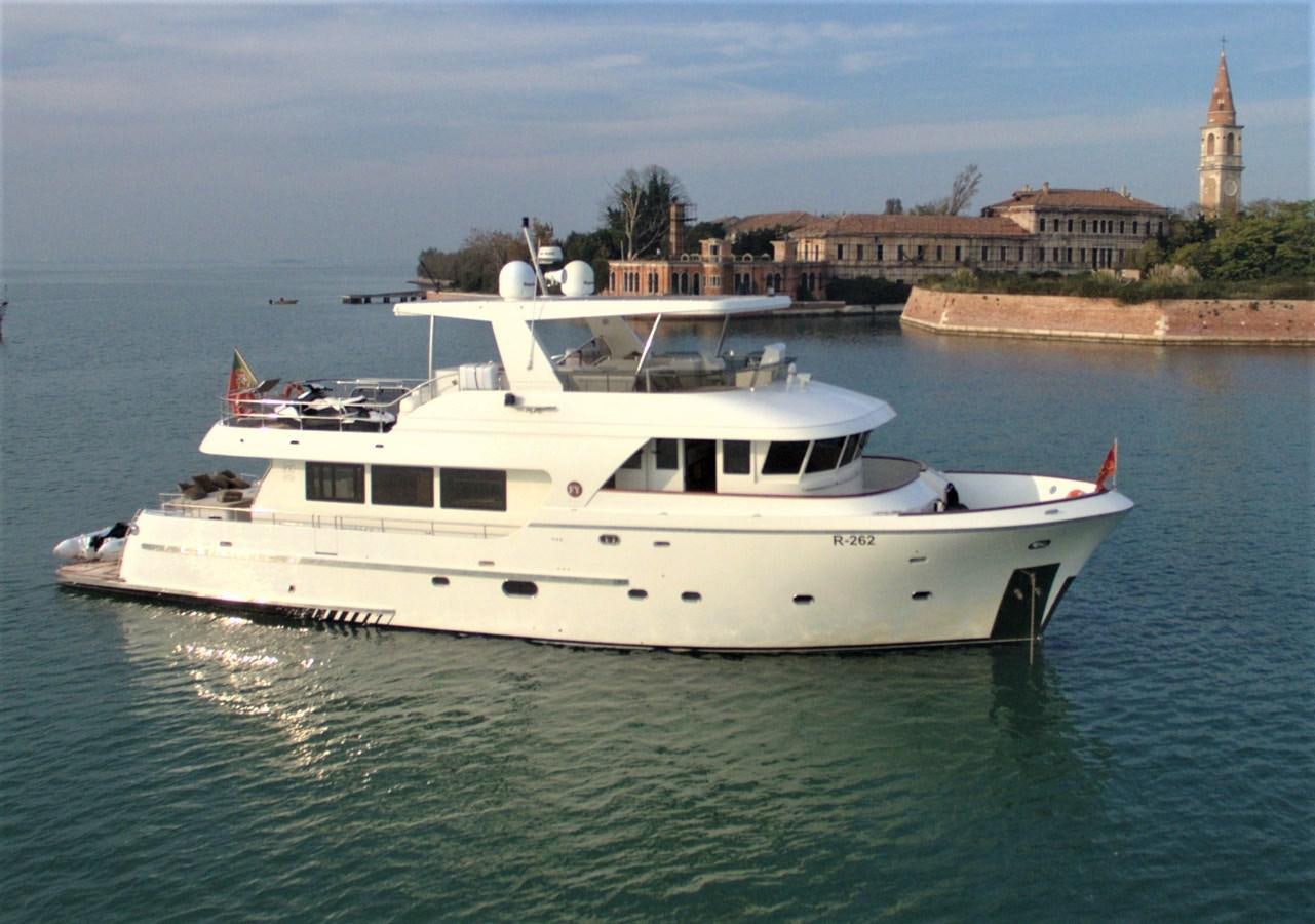 a white boat in the water aboard MY WAY Yacht for Sale