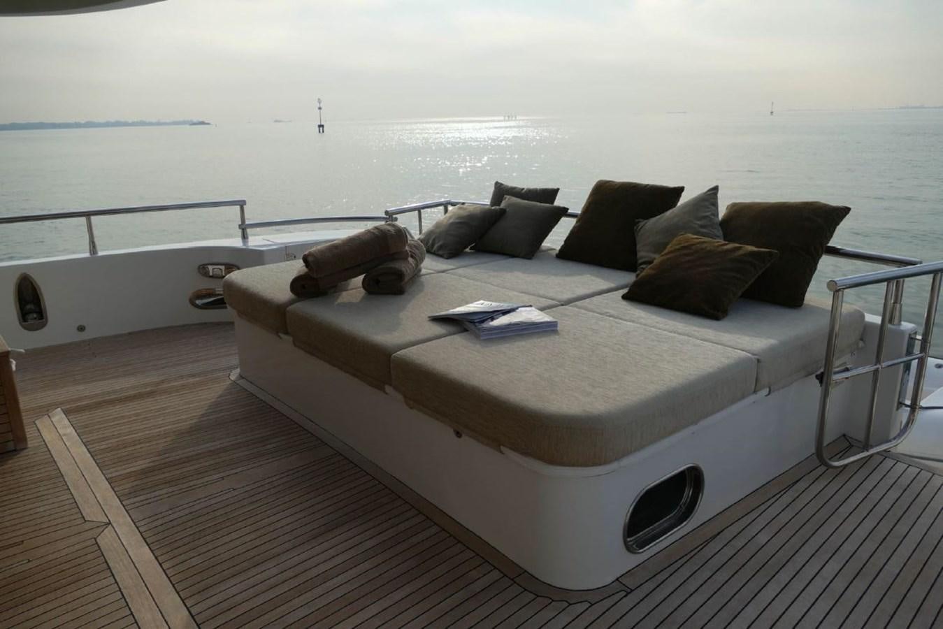 a bed on a deck aboard MY WAY Yacht for Sale