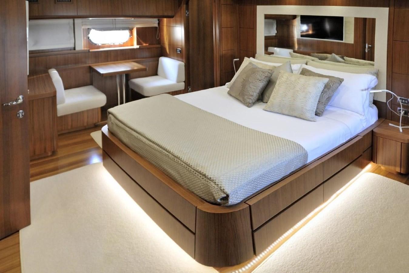 a bed with white sheets aboard MY WAY Yacht for Sale