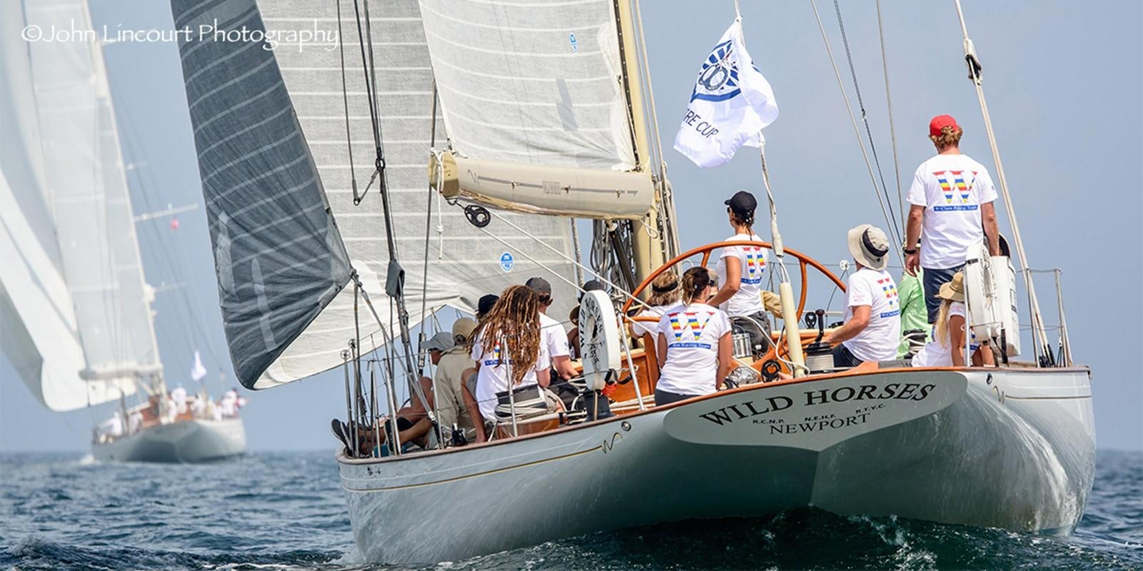 a group of people sailing on a boat aboard WILD HORSES Yacht for Sale