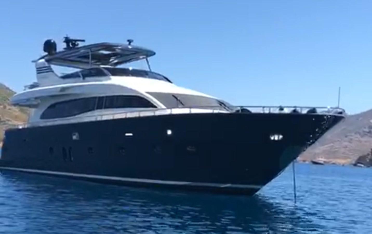 a white yacht on the water aboard TORO T Yacht for Sale