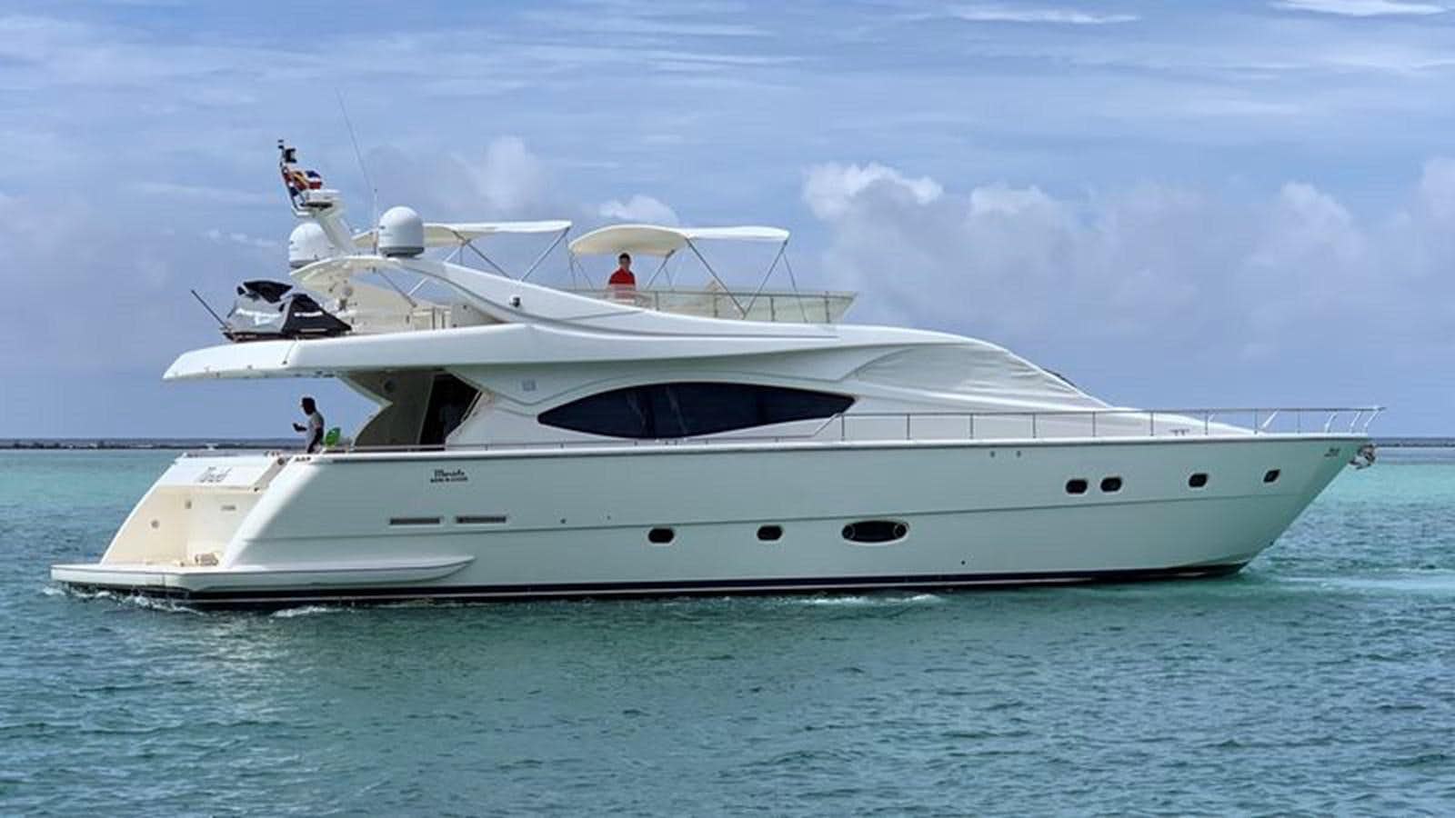a white yacht on the water aboard MARIELA Yacht for Sale