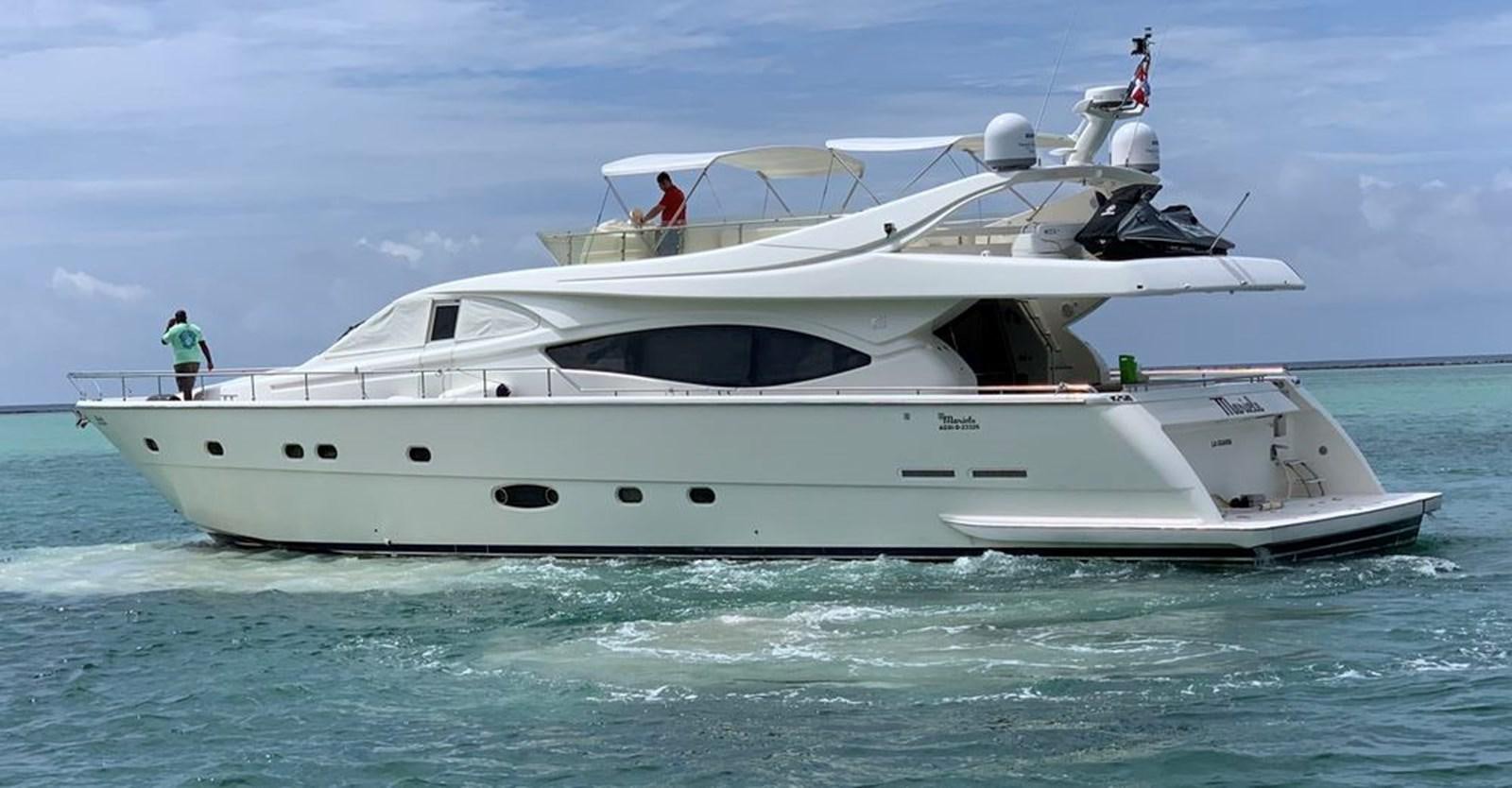 a white yacht in the water aboard MARIELA Yacht for Sale