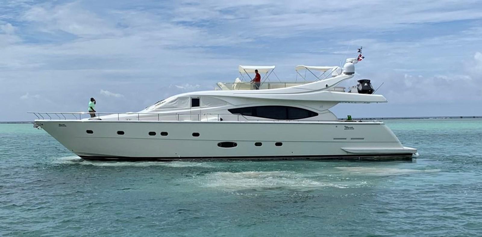 a white yacht in the water aboard MARIELA Yacht for Sale