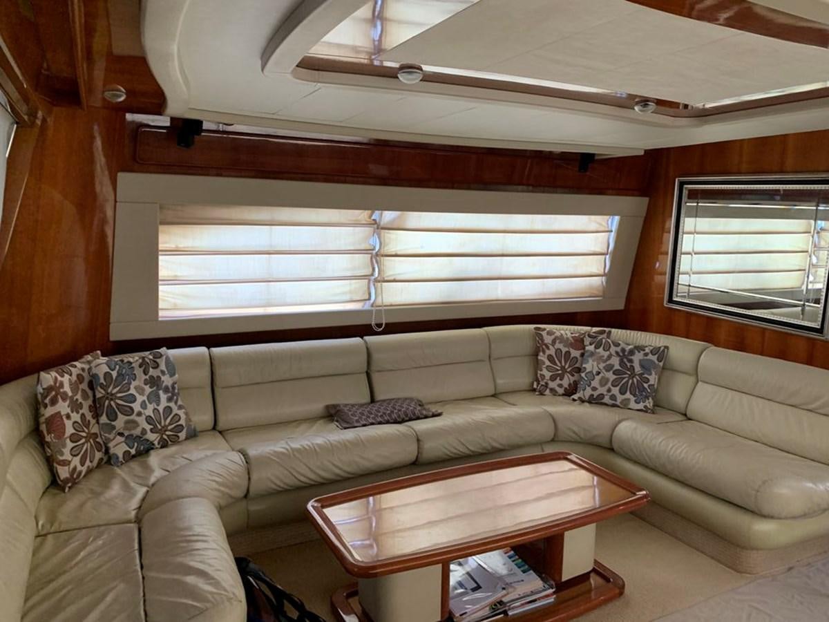 a living room with a couch aboard MARIELA Yacht for Sale