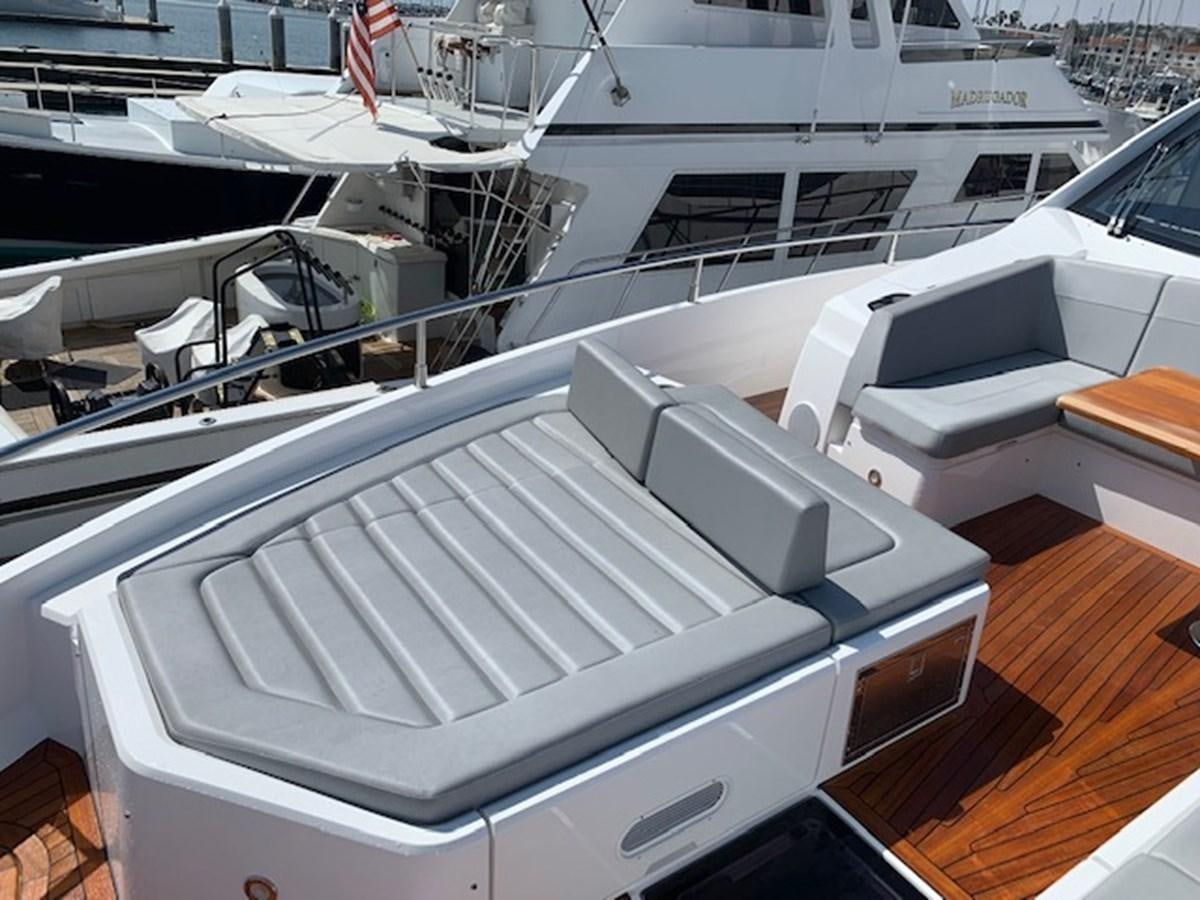 a large yacht in a harbor aboard SEA SCAPE Yacht for Sale