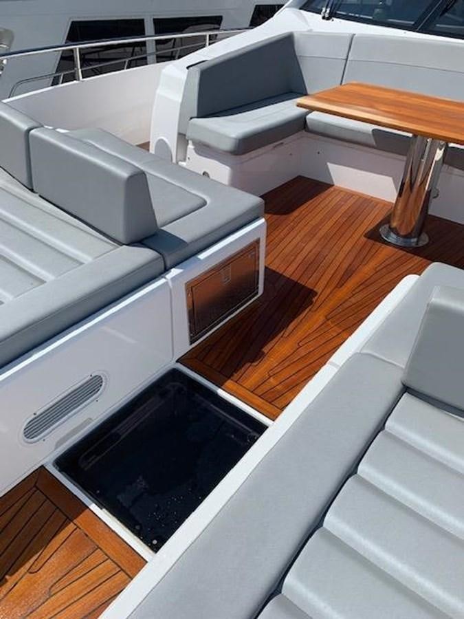 a printer on a wooden surface aboard SEA SCAPE Yacht for Sale