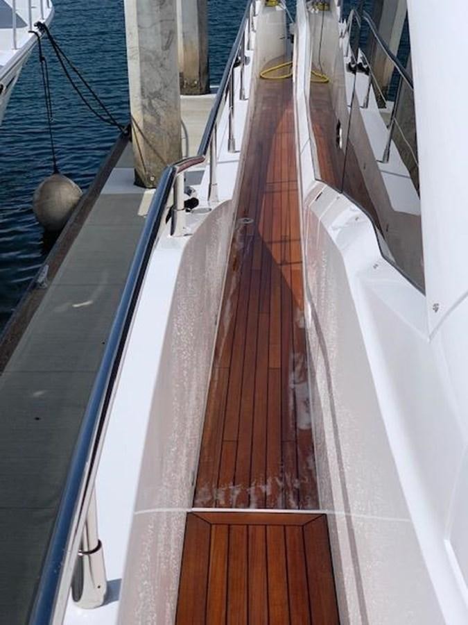 a long wooden staircase aboard SEA SCAPE Yacht for Sale