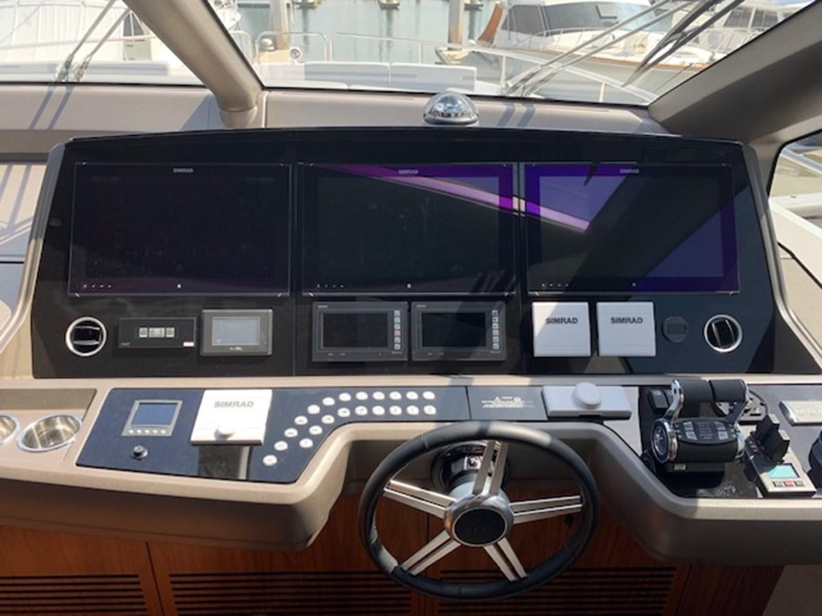 a car with a screen aboard SEA SCAPE Yacht for Sale