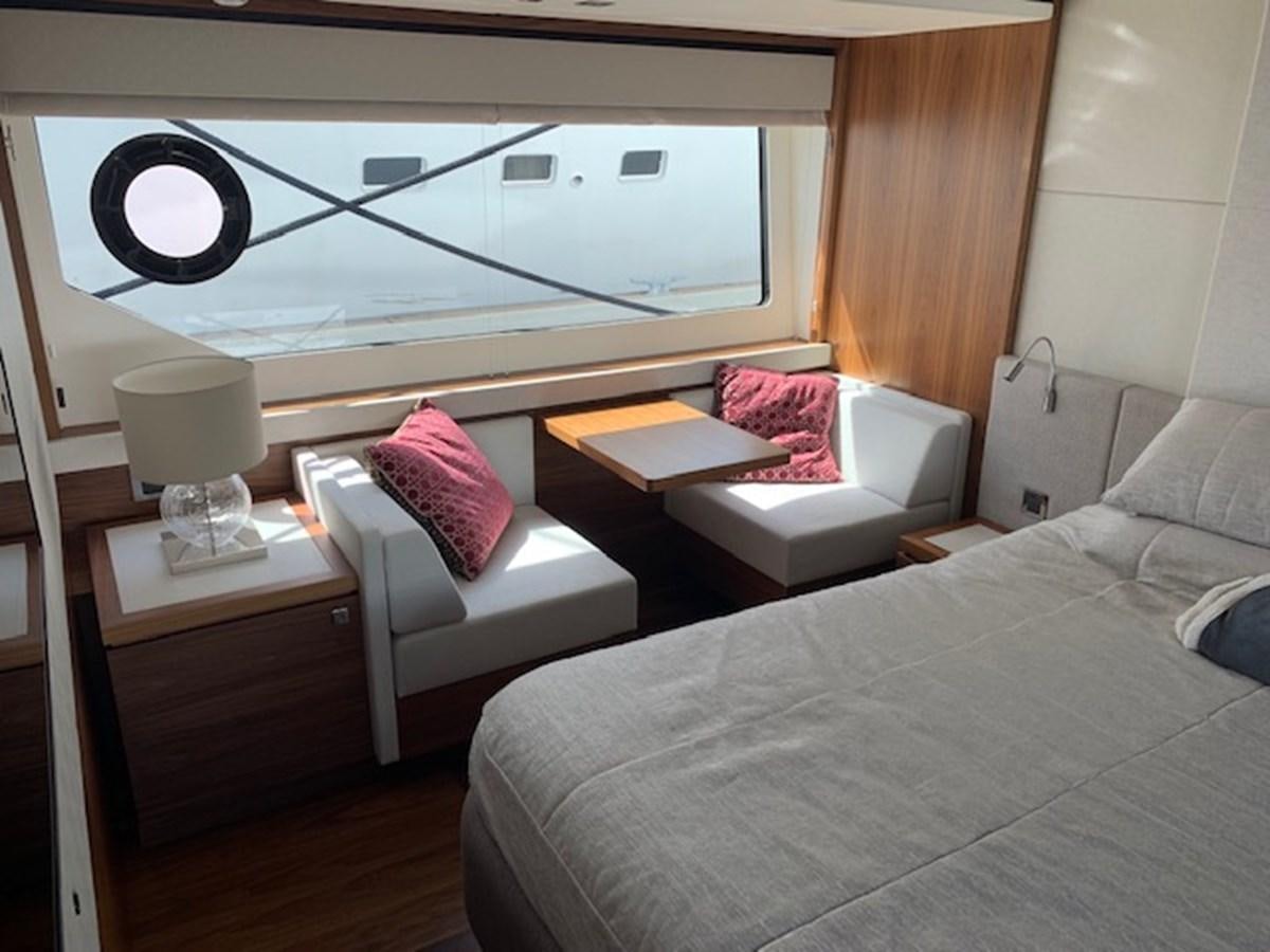 a room with a bed and a window aboard SEA SCAPE Yacht for Sale