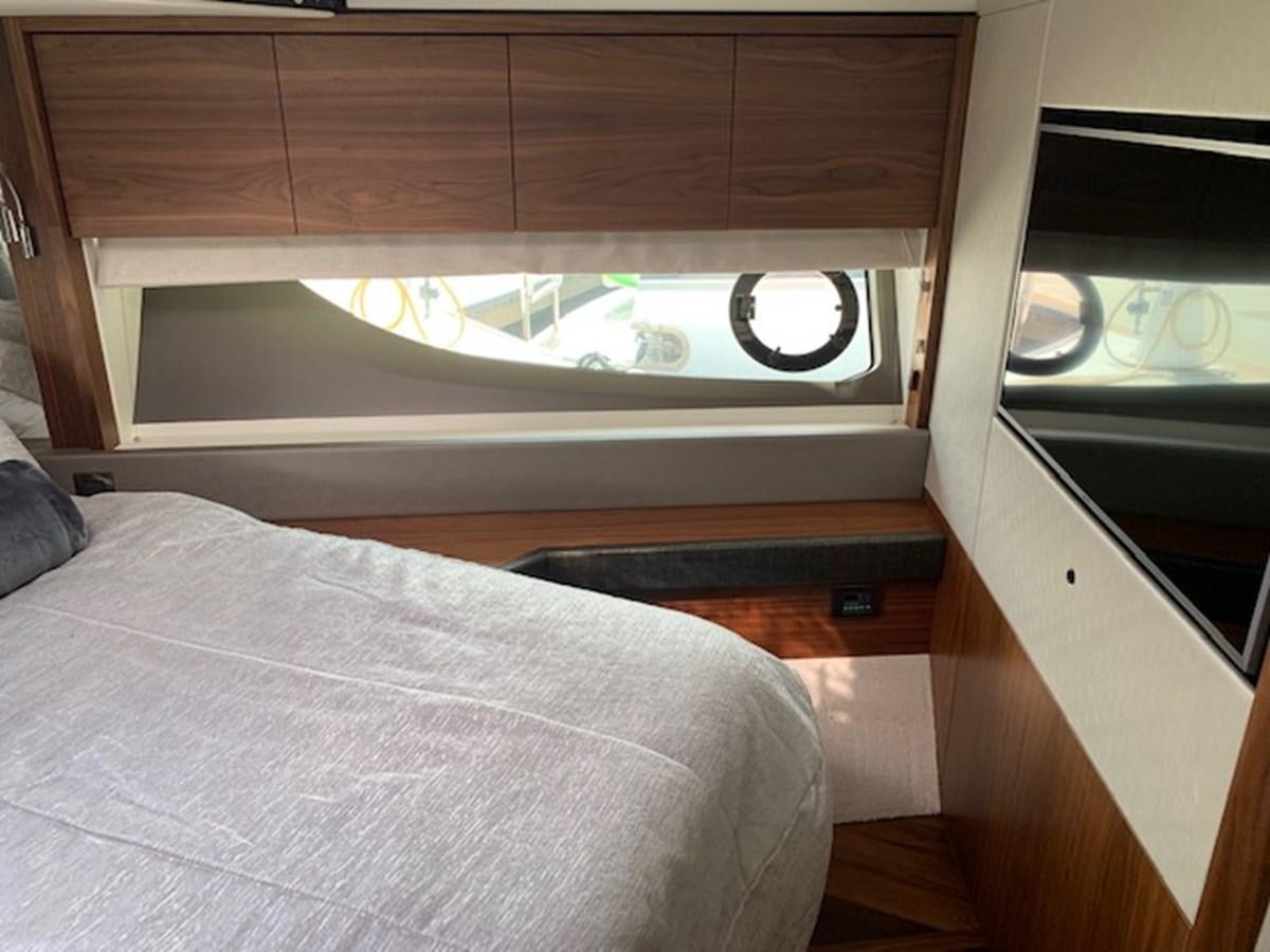 a bed in a room aboard SEA SCAPE Yacht for Sale