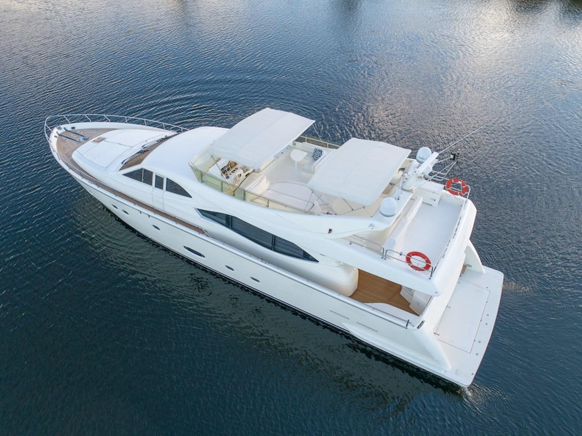 a white boat on the water aboard SEA PAL Yacht for Sale