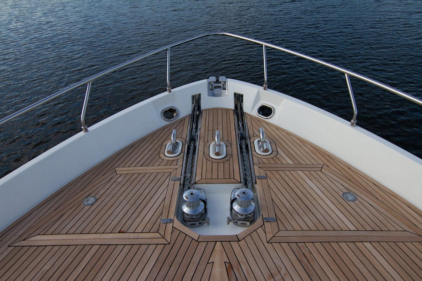 a wooden deck with a ship deck aboard SEA PAL Yacht for Sale