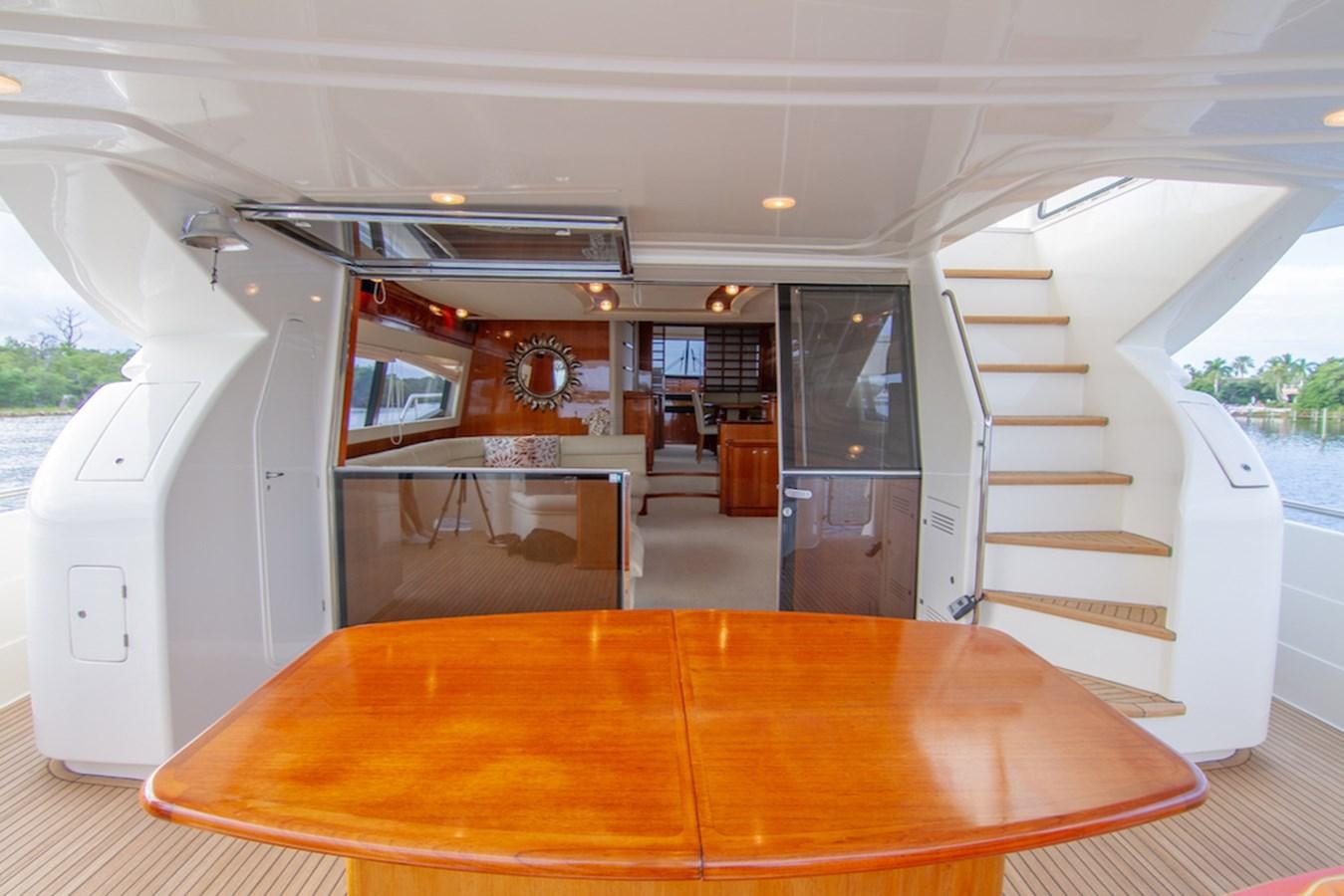 a large kitchen with a table aboard SEA PAL Yacht for Sale