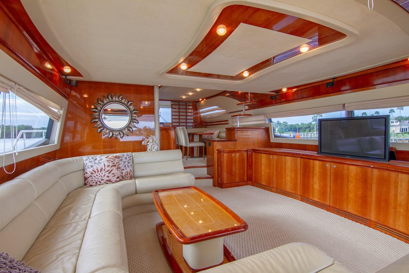 a living room with a large window aboard SEA PAL Yacht for Sale
