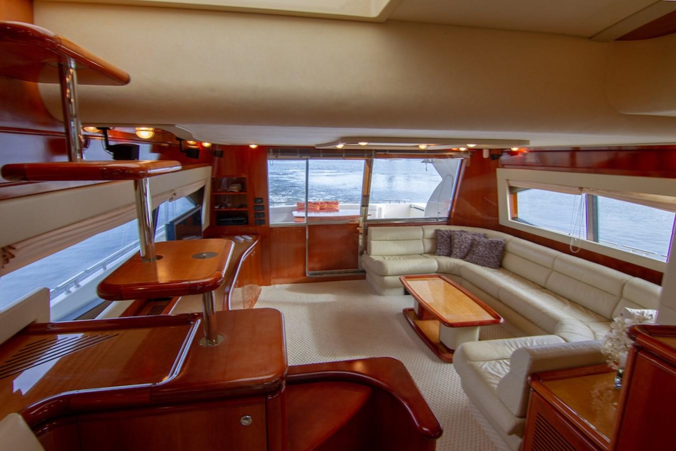 a room with a couch and a table aboard SEA PAL Yacht for Sale