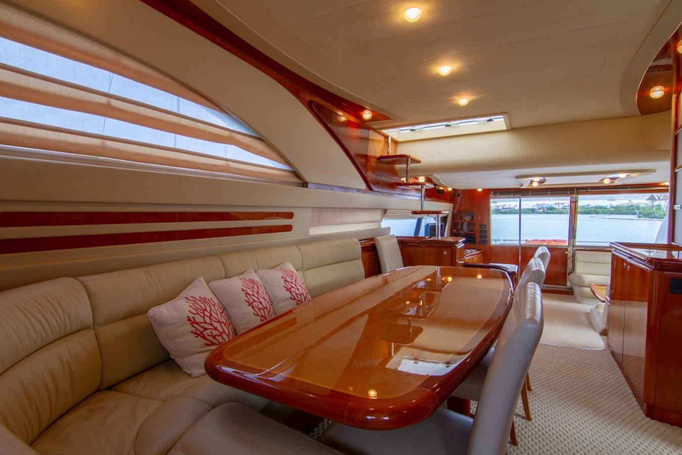 a room with a couch and a table aboard SEA PAL Yacht for Sale