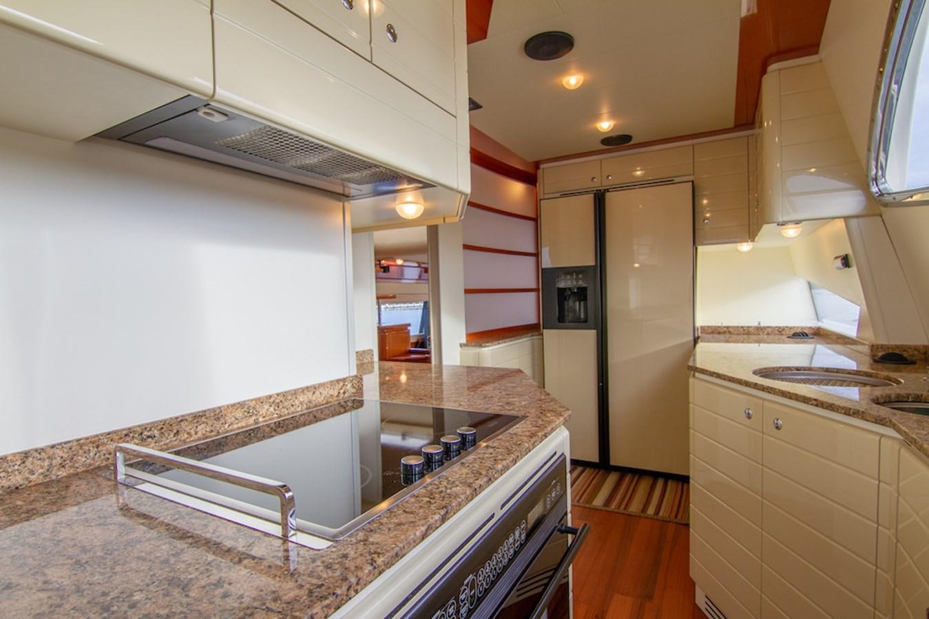 a kitchen with a large marble counter aboard SEA PAL Yacht for Sale