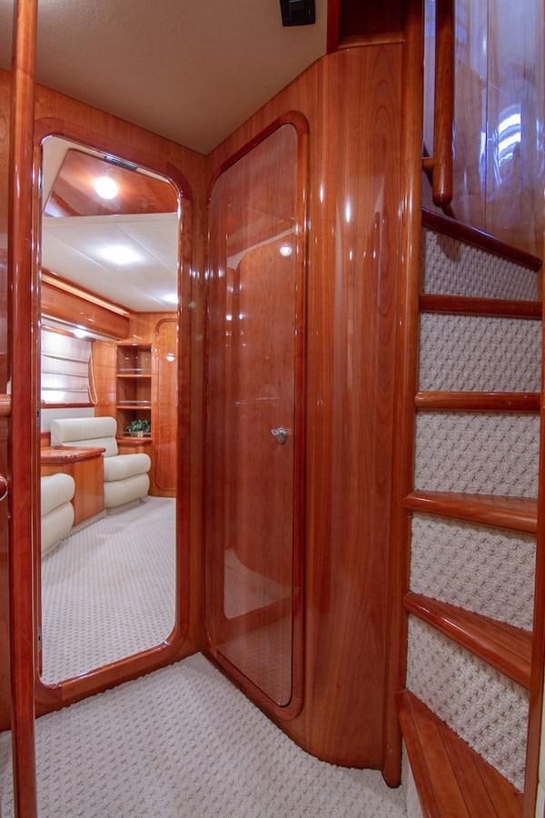 a room with a wood door aboard SEA PAL Yacht for Sale