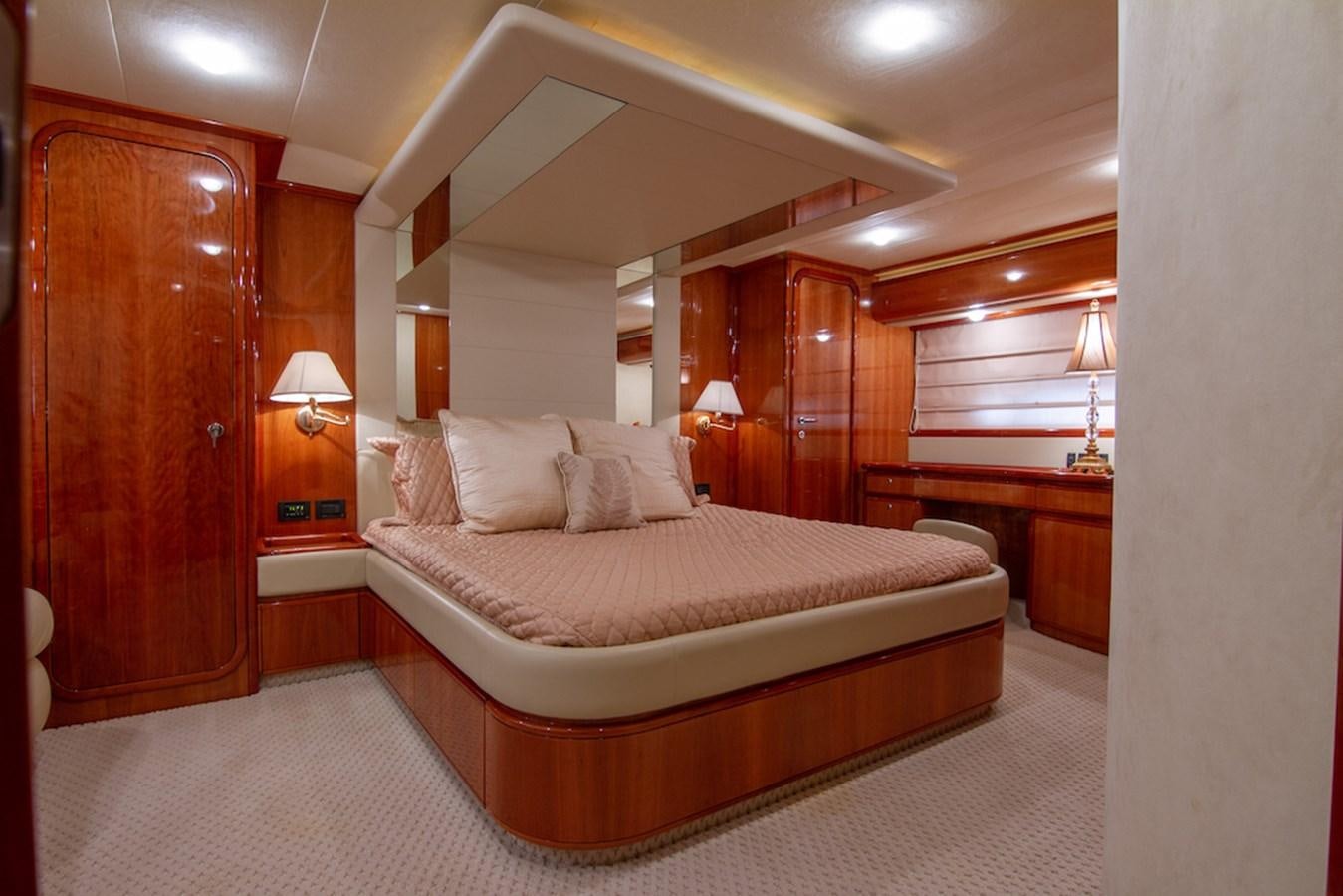 a large bed in a hotel room aboard SEA PAL Yacht for Sale