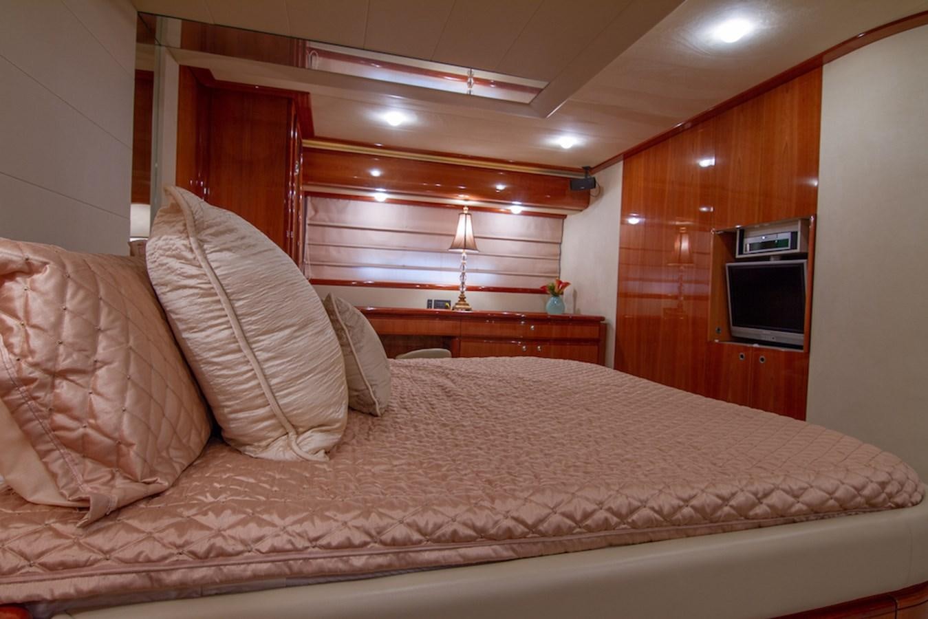 a bed with a pillow and pillows aboard SEA PAL Yacht for Sale