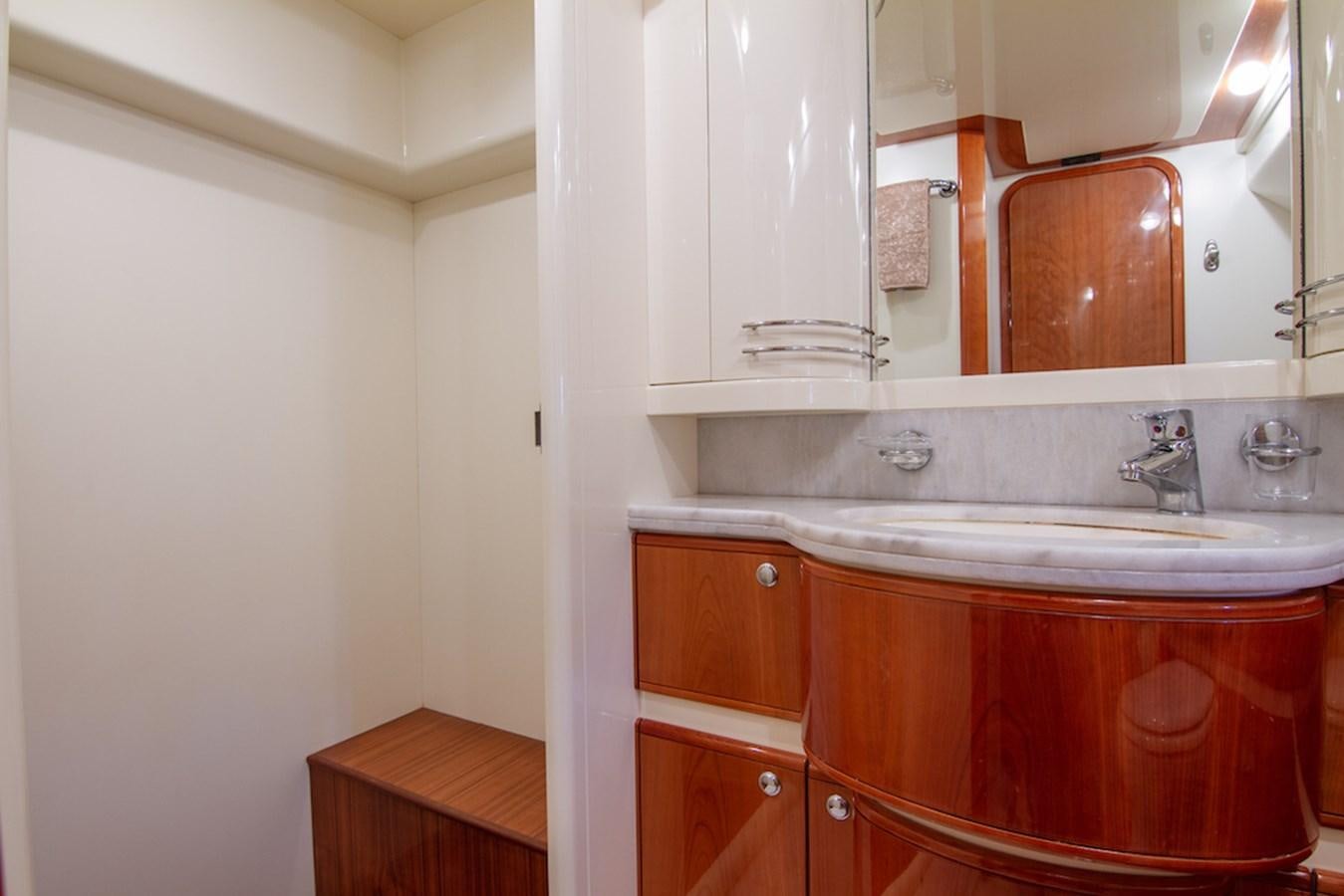a bathroom with a sink and cabinets aboard SEA PAL Yacht for Sale