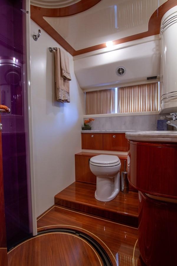 a bathroom with a toilet and sink aboard SEA PAL Yacht for Sale