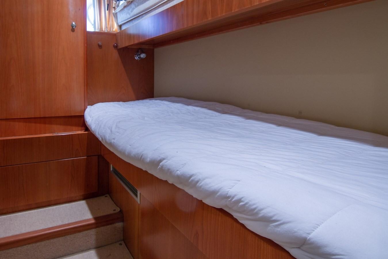 a bed in a room aboard SEA PAL Yacht for Sale