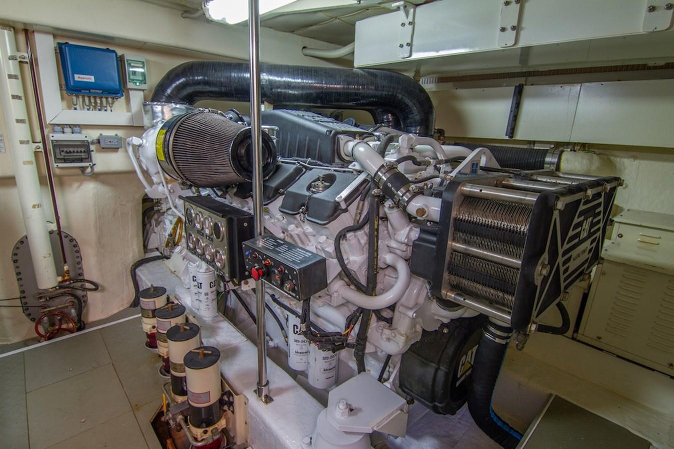 a machine with a large metal cylinder aboard SEA PAL Yacht for Sale