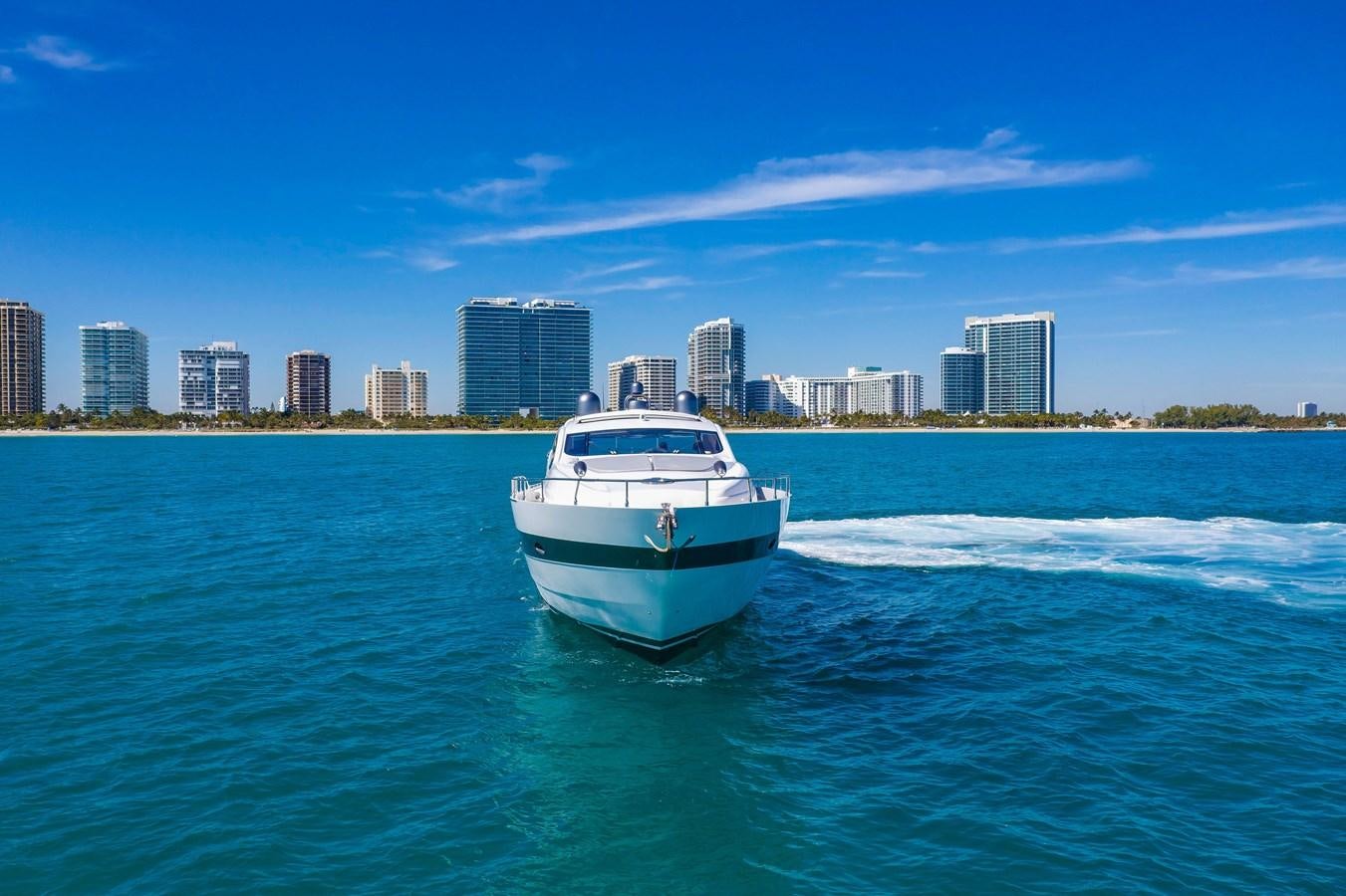 a white boat on the water aboard FREE SPIRIT Yacht for Sale