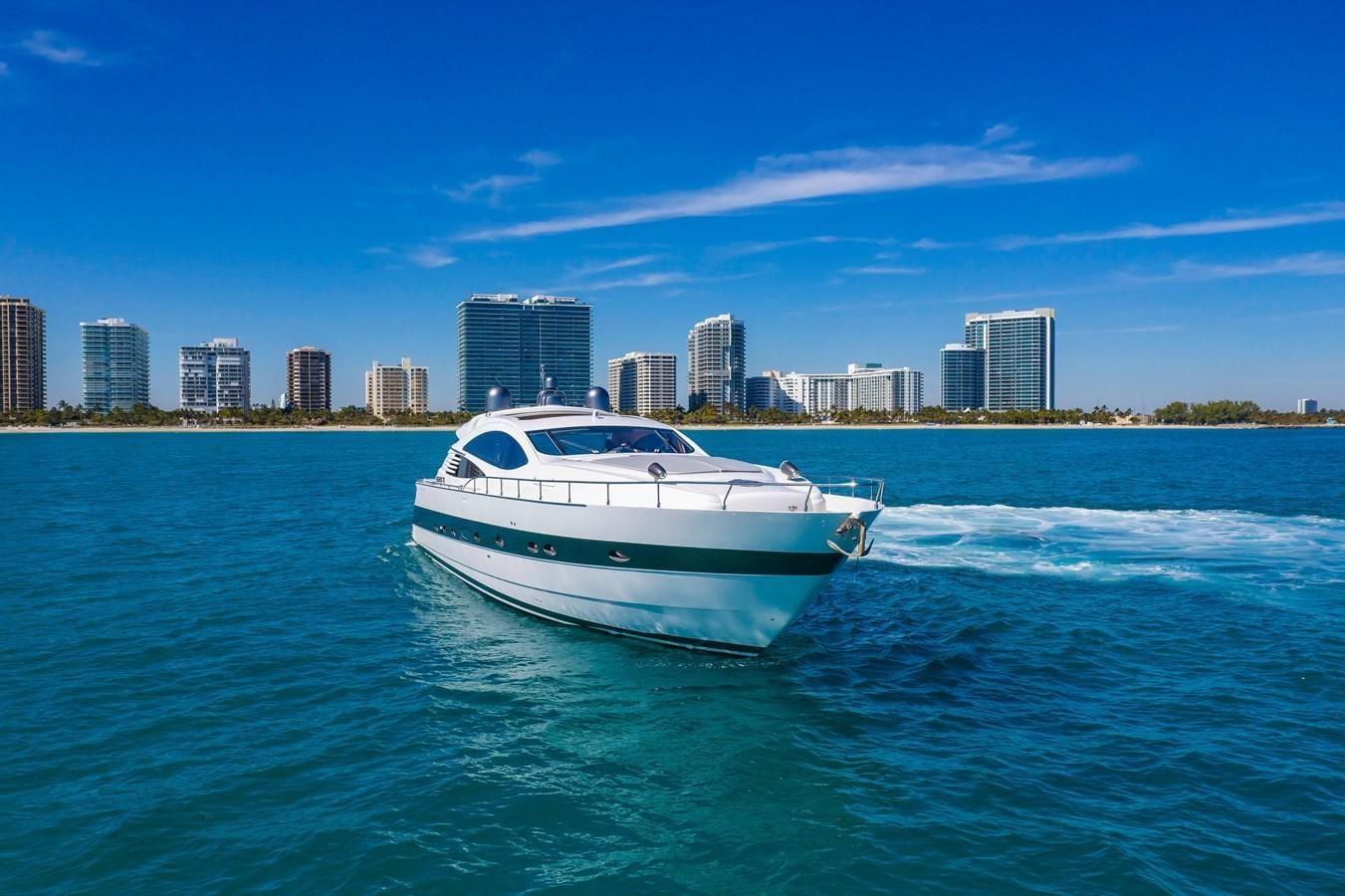 a white yacht in the water aboard FREE SPIRIT Yacht for Sale