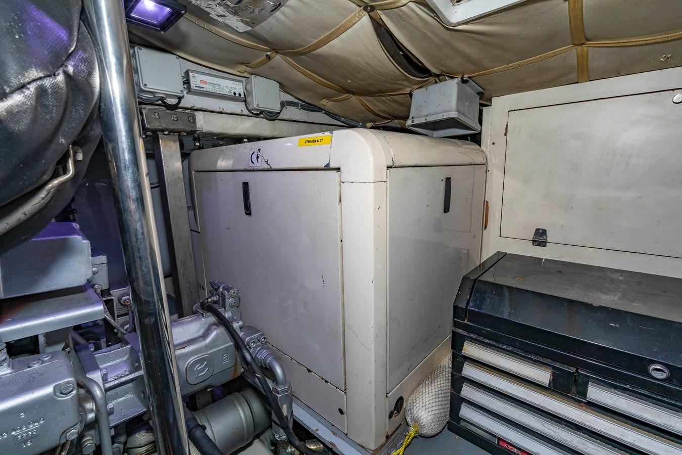 a machine in a room aboard FREE SPIRIT Yacht for Sale