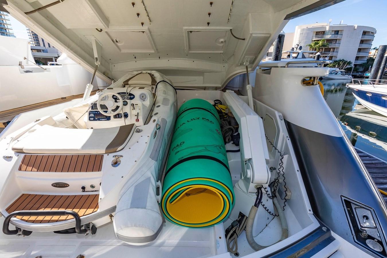 a large white ship with a green and yellow cone on the front aboard FREE SPIRIT Yacht for Sale
