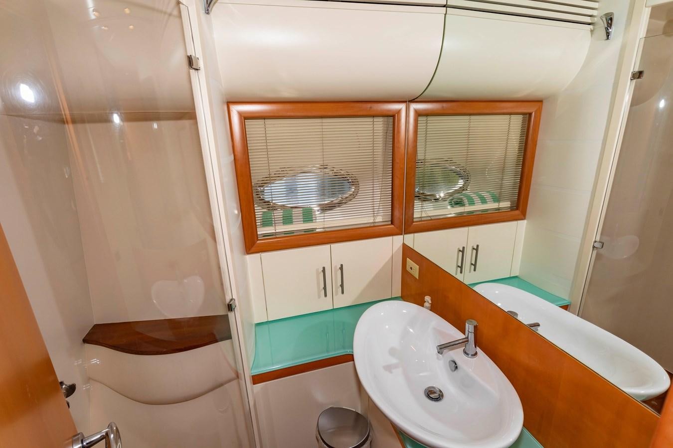a bathroom with a sink and a bathtub aboard FREE SPIRIT Yacht for Sale