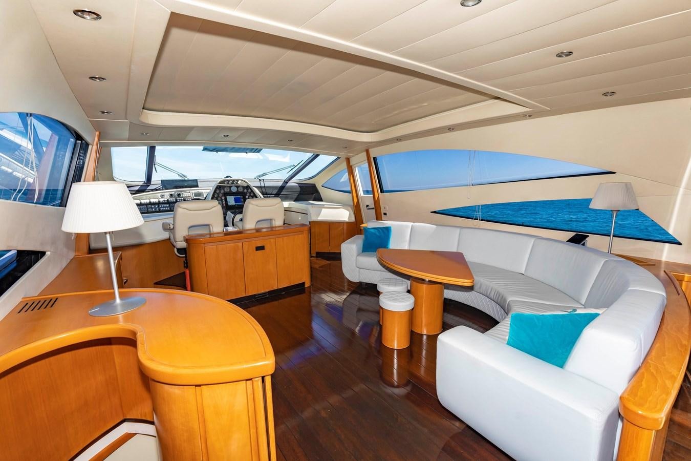 a room with a bed and a table aboard FREE SPIRIT Yacht for Sale