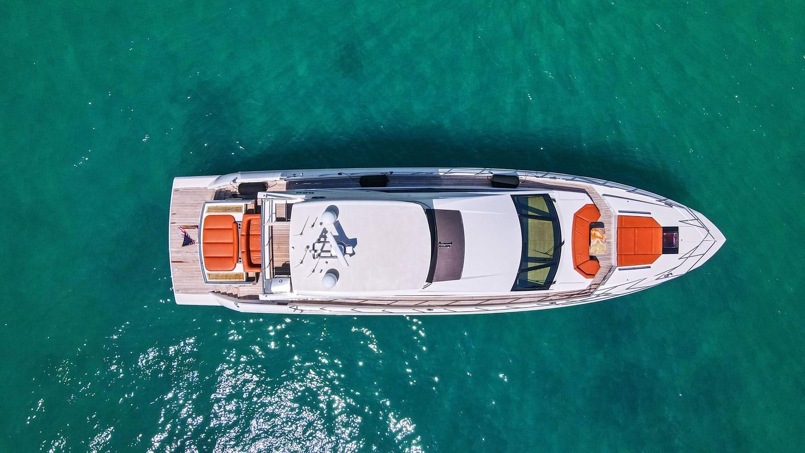 a white boat on water aboard Gramercy 28 Yacht for Sale