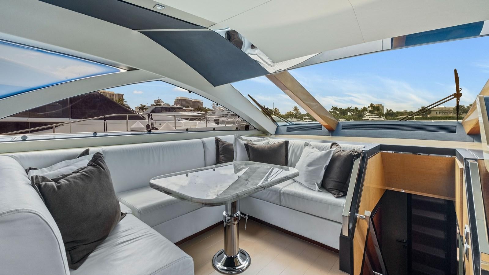 a room with a bed and a pool aboard Gramercy 28 Yacht for Sale