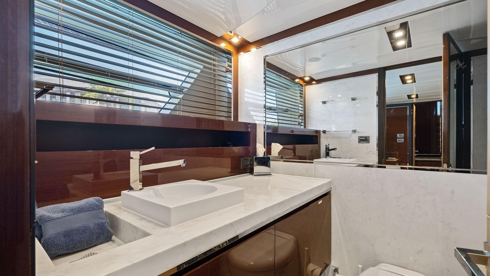 a bathroom with a large tub aboard Gramercy 28 Yacht for Sale